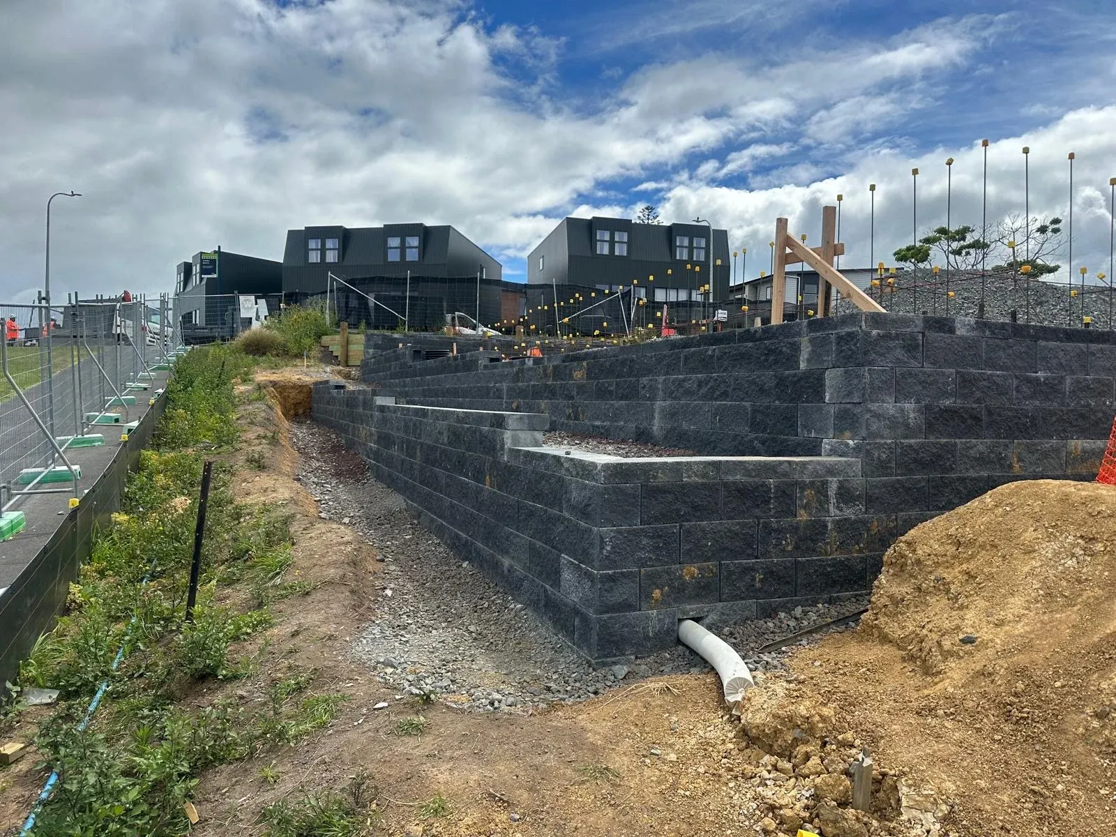 Completed retaining wall on the Glen Innes subdivision, finished face running the length of a building platform.